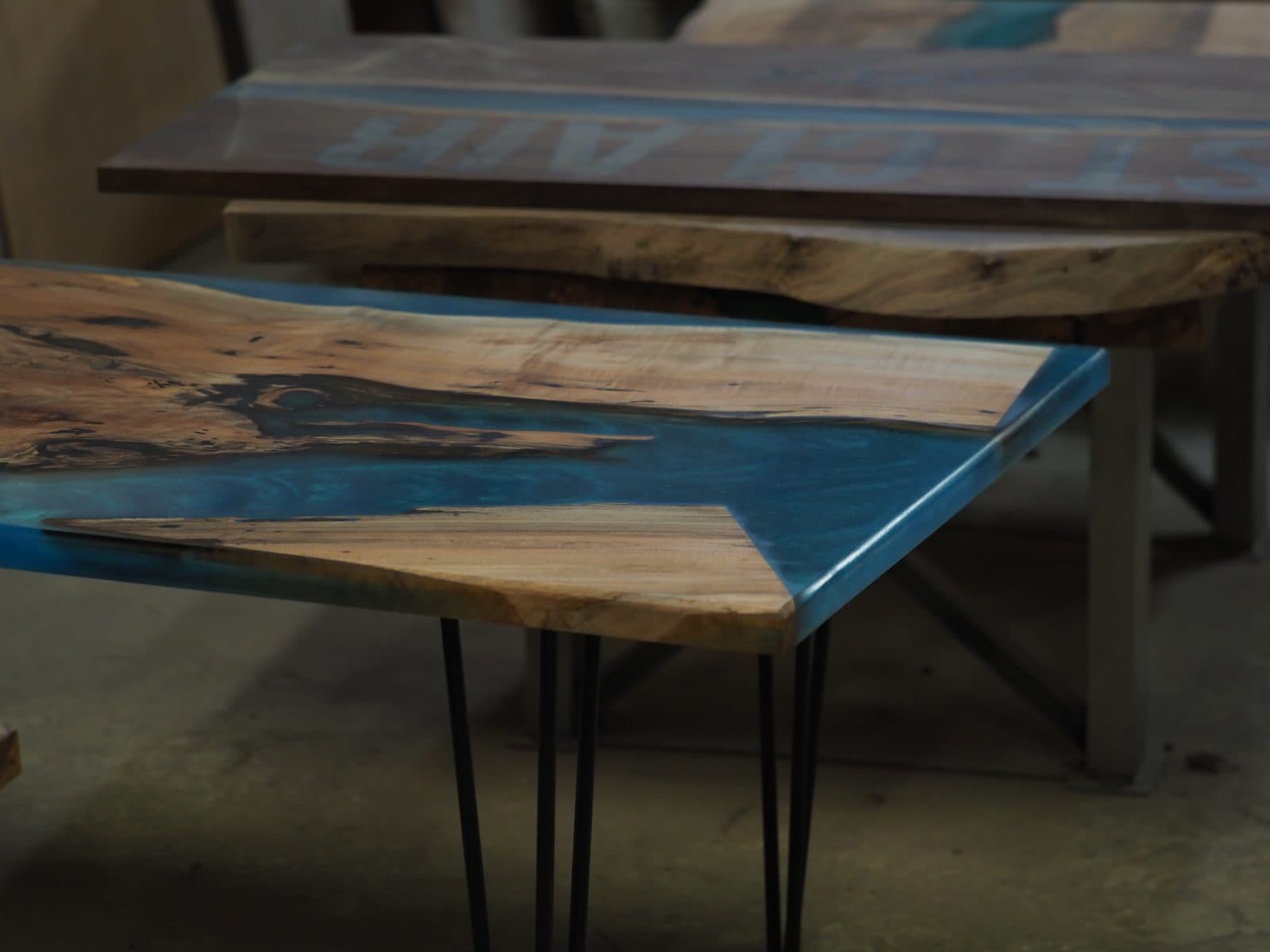 Blue epoxy tables with hairpin legs